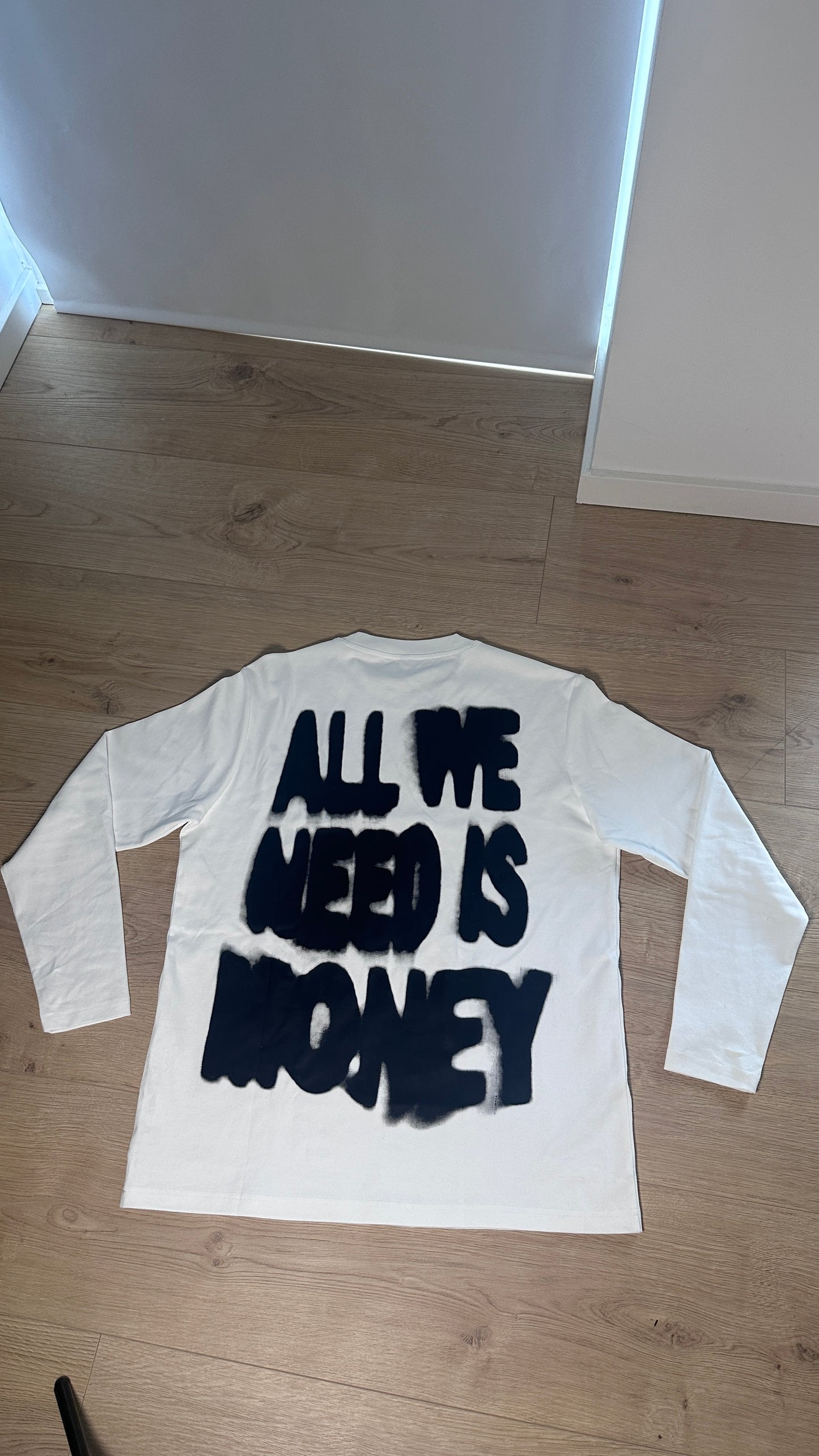 Long sleeve white ( ALL WE NEED IS MONEY)